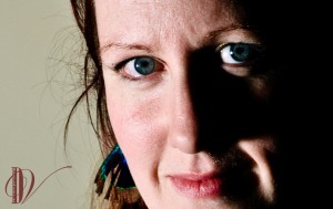 One light, lightly forward of 90 deg to photographer's left. 