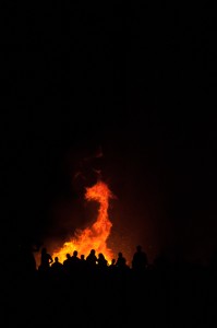 Fire in the shape of a Dragon's head rising from the effigy's flames.