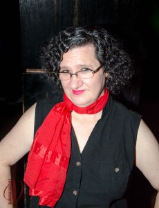 Wendi in bright red scarf.